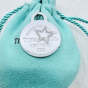 RETIRED Tiffany & Co LARGE Round Star Diamond Charm Pendant in Silver